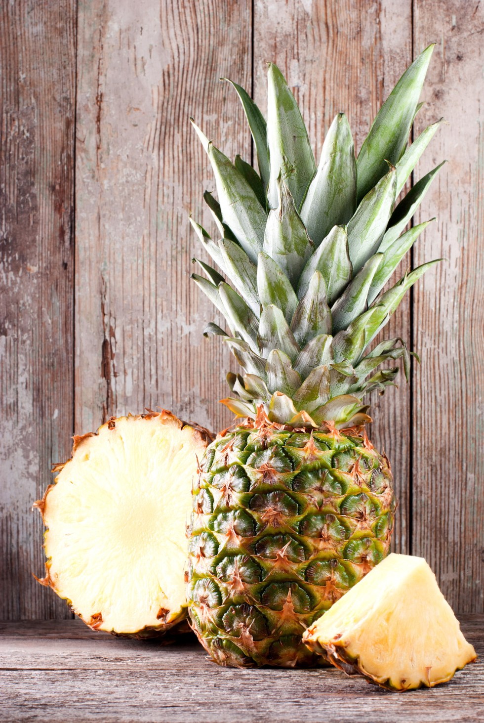 sliced ripe pineapple on the table
